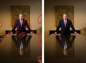 Side-by-side comparison of a marked-up and final retouched executive portrait photographed in a Houston boardroom. Subject is a middle-aged man in a dark suit and red tie, standing behind a conference table with his reflection visible. Shot with low camera angle for symmetry. Lighting balanced to highlight the subject evenly. Photographed and retouched by Solaris Studios.