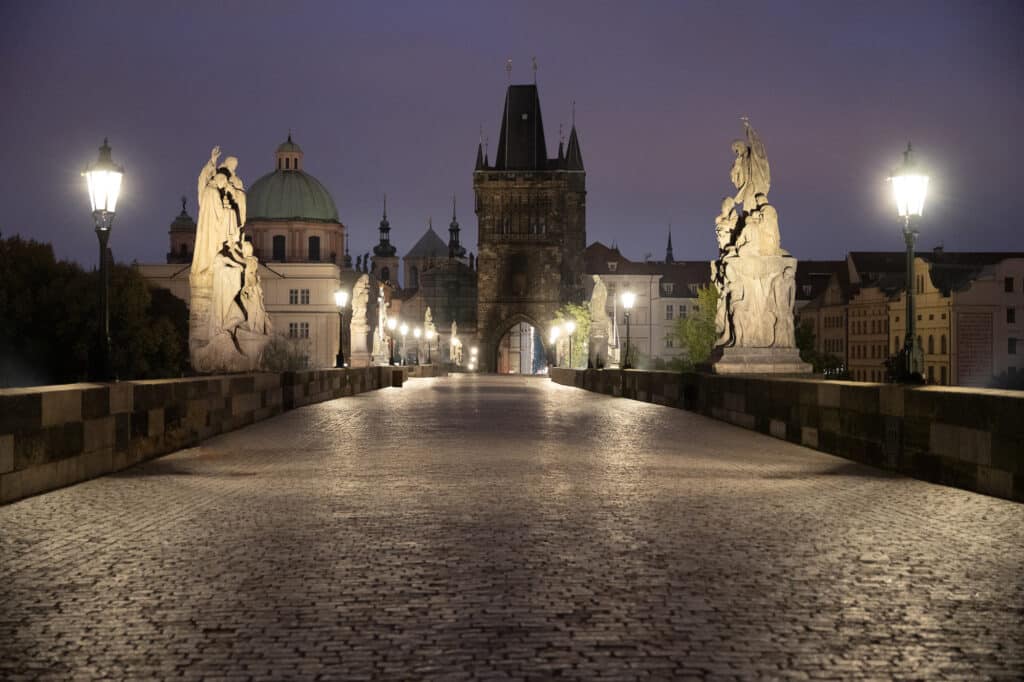 Pre-dawn view of Prague’s Charles Bridge, captured at 1/15 second using the Bevis Gear camera bag as a stable shooting platform. This handheld workaround highlights the bag’s role as more than just storage—essential for photographers traveling light.
