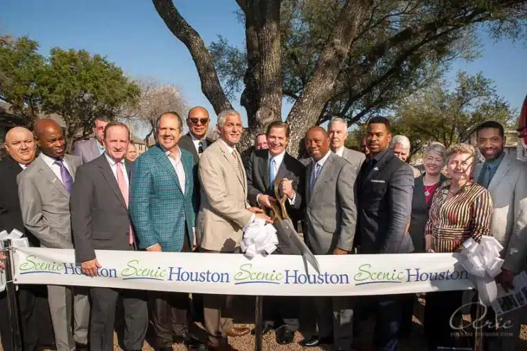 Former Houston Mayor Sylvester Turner and community leaders participating in a Scenic Houston ribbon cutting ceremony during an outdoor civic event